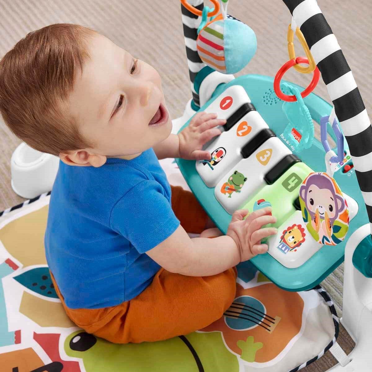 Fisher-Price Piyanolu Oyun Halısı Neşeli Hayvanlar Tasarımlı, Işıklı, 85+ Şarkılı ve 10 Aktivite Oyuncaklı Jimnastik Merkezi - Roket Oyuncak