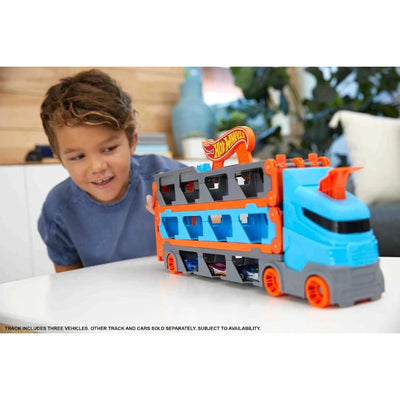 Hot Wheels Sürat Pistli Tır 180 cm Uzayan Katlanabilir Yarış Pistli, İkili Fırlatıcılı ve 22 Araç Kapasiteli Devasa Taşıyıcı Kamyon - Roket Oyuncak